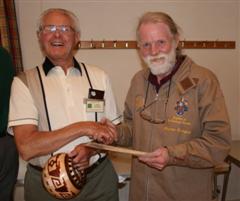 The monthly winner Frank Hayward received his certificate from Stephen Cooper